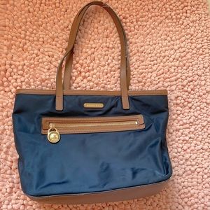 Navy and brown small bag. Used.